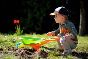 Boy Gardening | GardenersPath.com